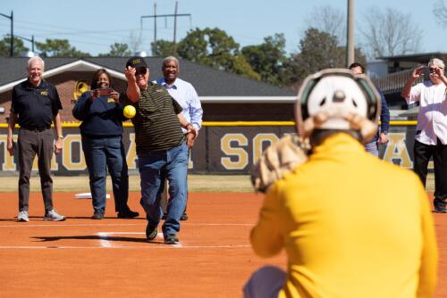 Dr. Larry Keen throws the first pitch.