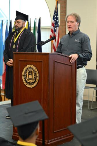 Dr. Marks Sorrells speaks at the podium.